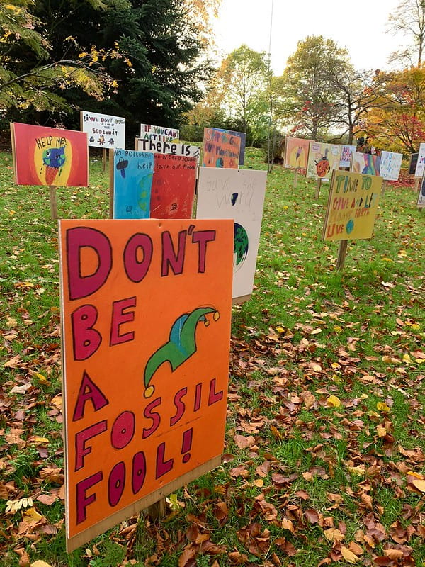 Don't be a fossil fool! Climate change protest signs.