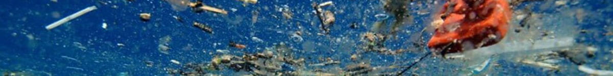 Plastic debris floating on the surface of the ocean