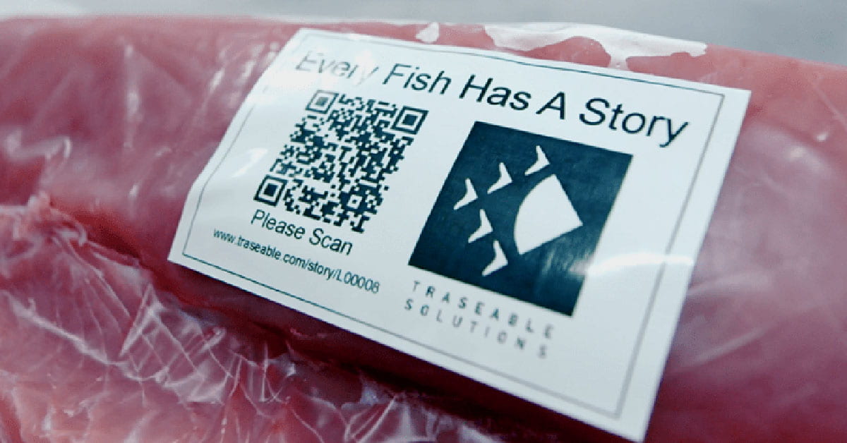 A piece of tuna in plastic with a label featuring a QR code and the words "Every fish has a story"