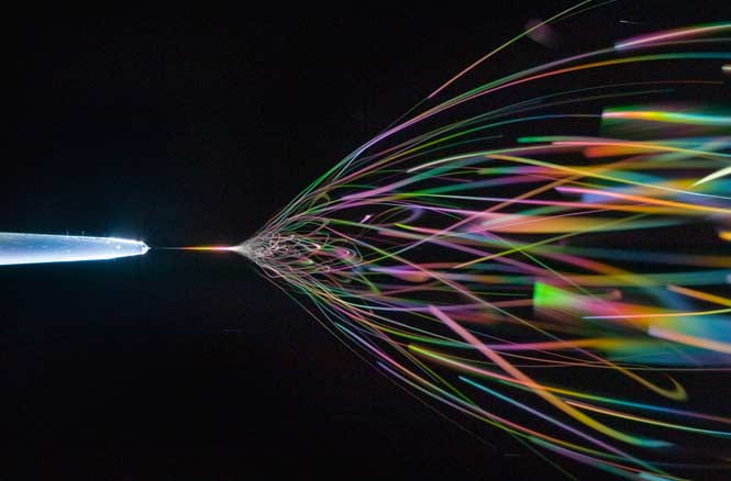 Rainbow-coloured nanofibres emerge from a needle point