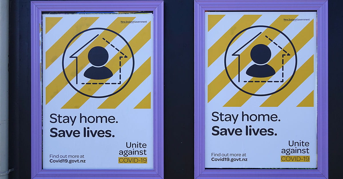 Yellow and white COVID-19 posters with the words 'Stay home save lives'